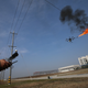 Electric company maintenance workers in Xiangyang, China used a fire-shooting drone to burn garbage from electrical wires (Photo by Wang Hu/VCG)